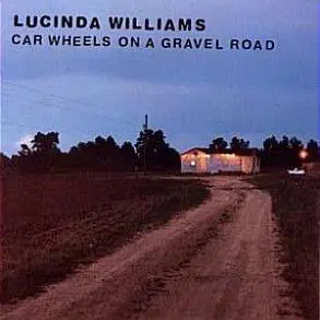 Car Wheels On A Gravel Road 1